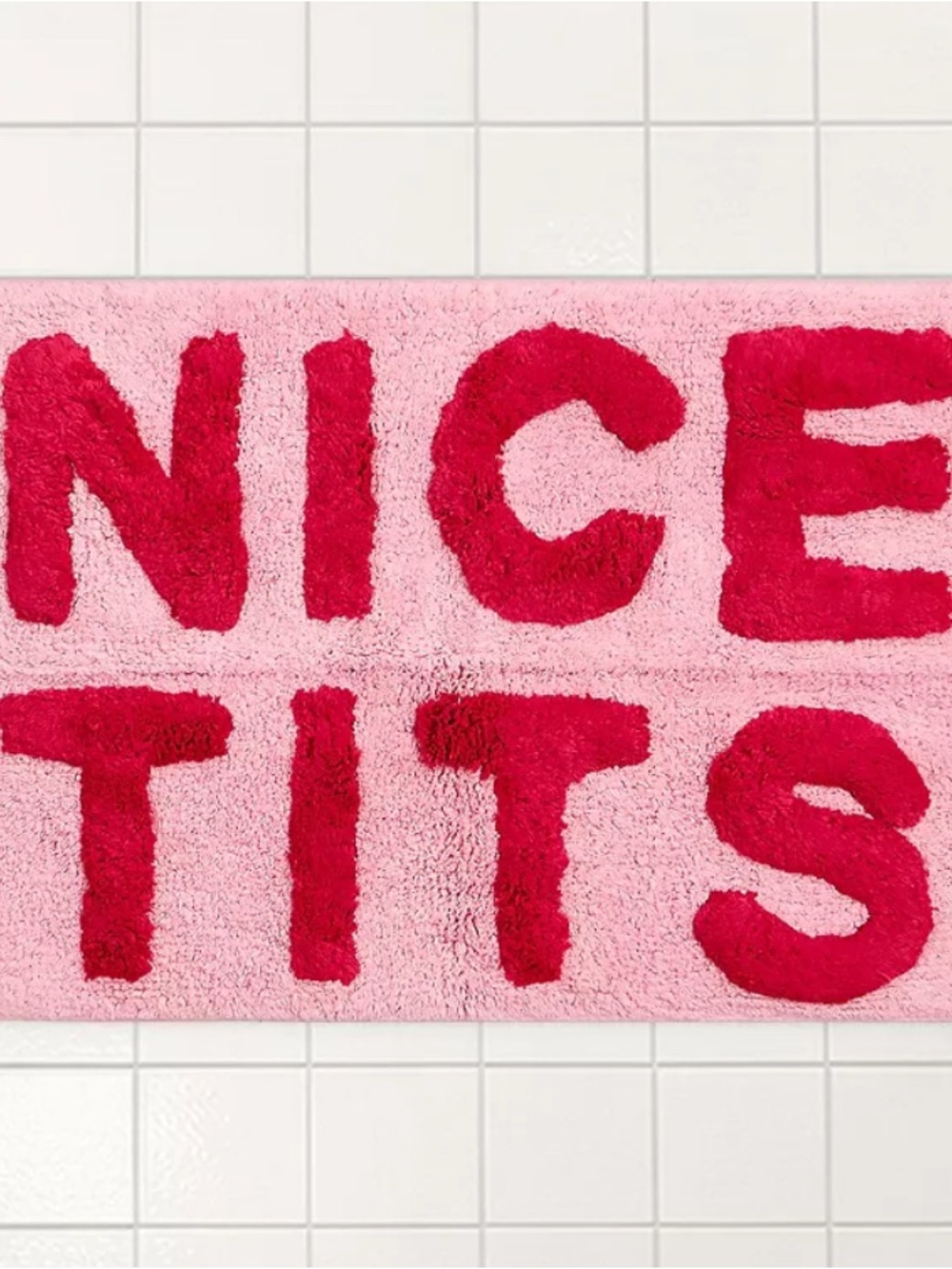 Urban Outfitters Pink Bath Mat with Bold Red Lettering Area rug carpet bathroom